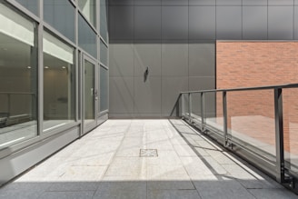 stainless steel railings near glass window