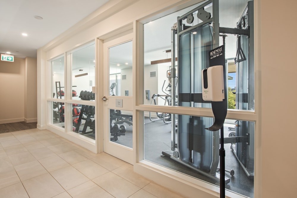 white wooden framed glass door