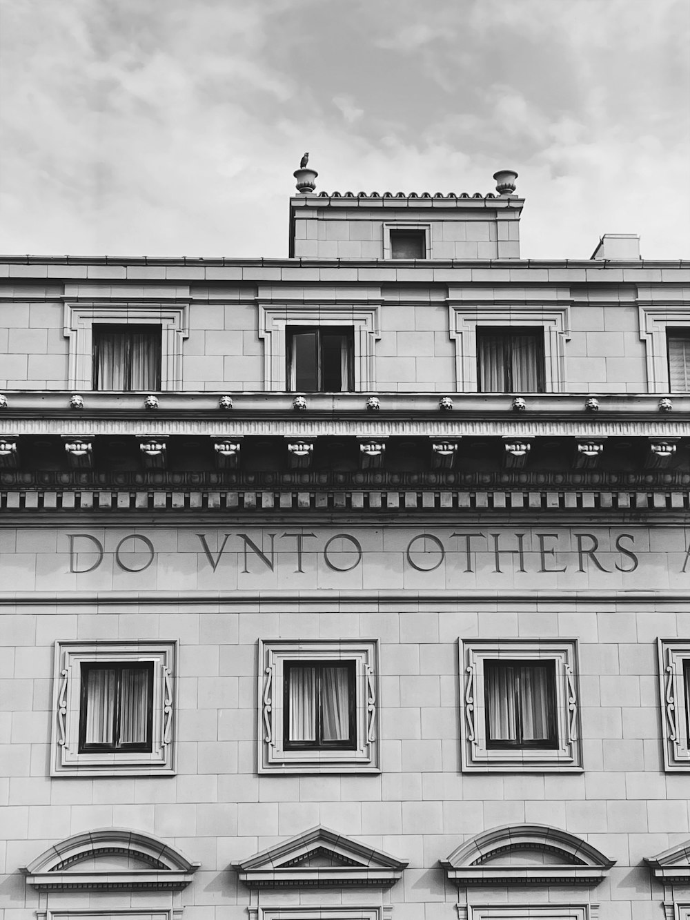 grayscale photo of concrete building