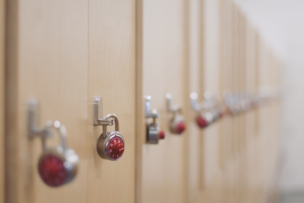 red and silver padlock on door