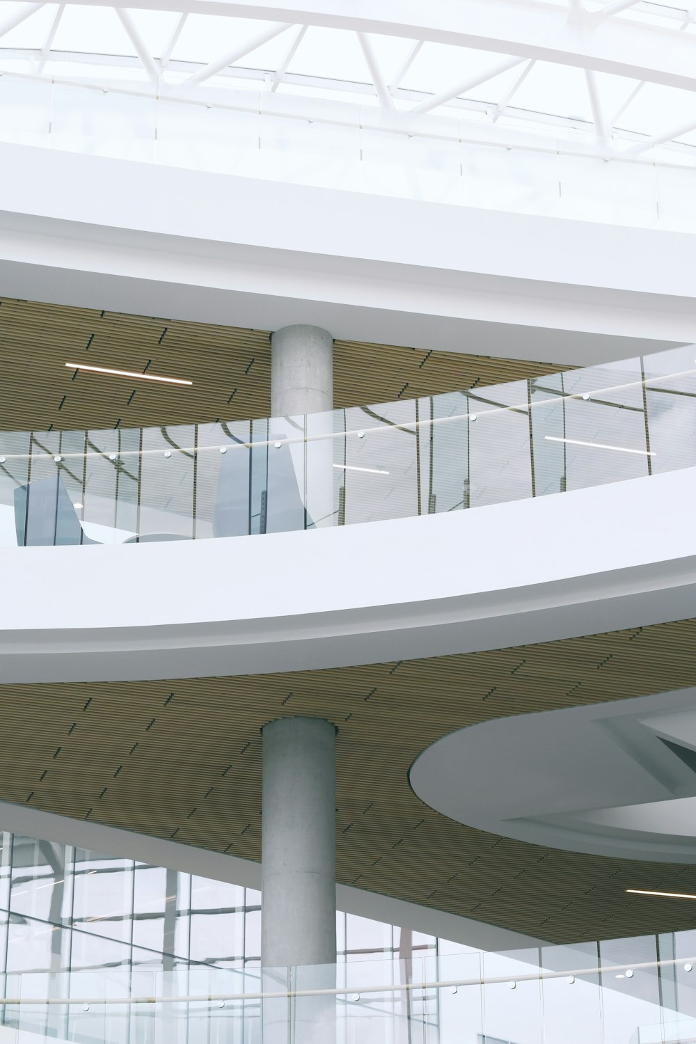 white concrete building with white metal railings