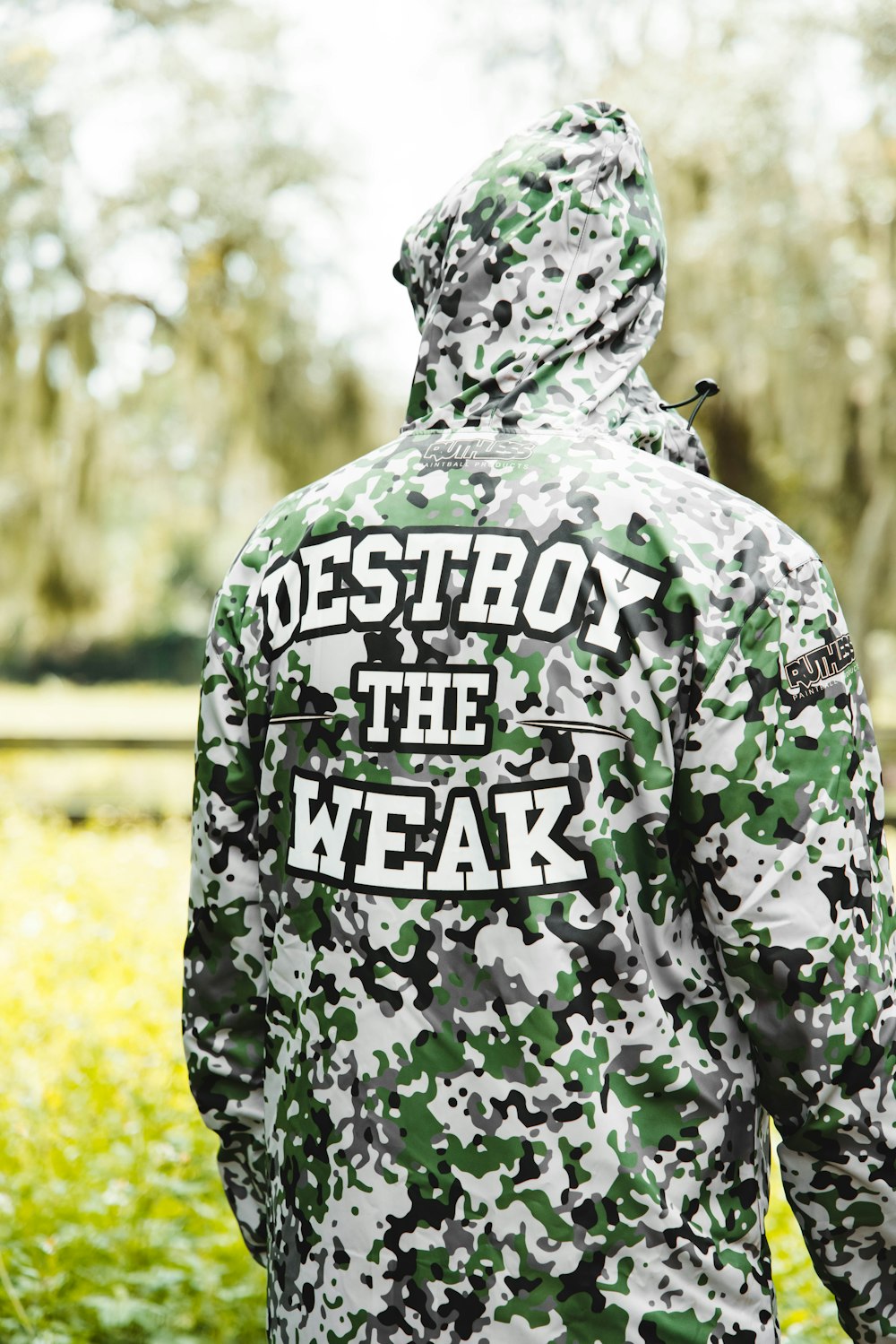 person in green and white camouflage hoodie