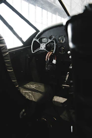 An artistic shot of vintage flight instruments bathed in warm, golden light.