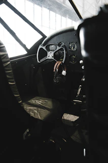 An artistic shot of vintage flight instruments bathed in warm, golden light.