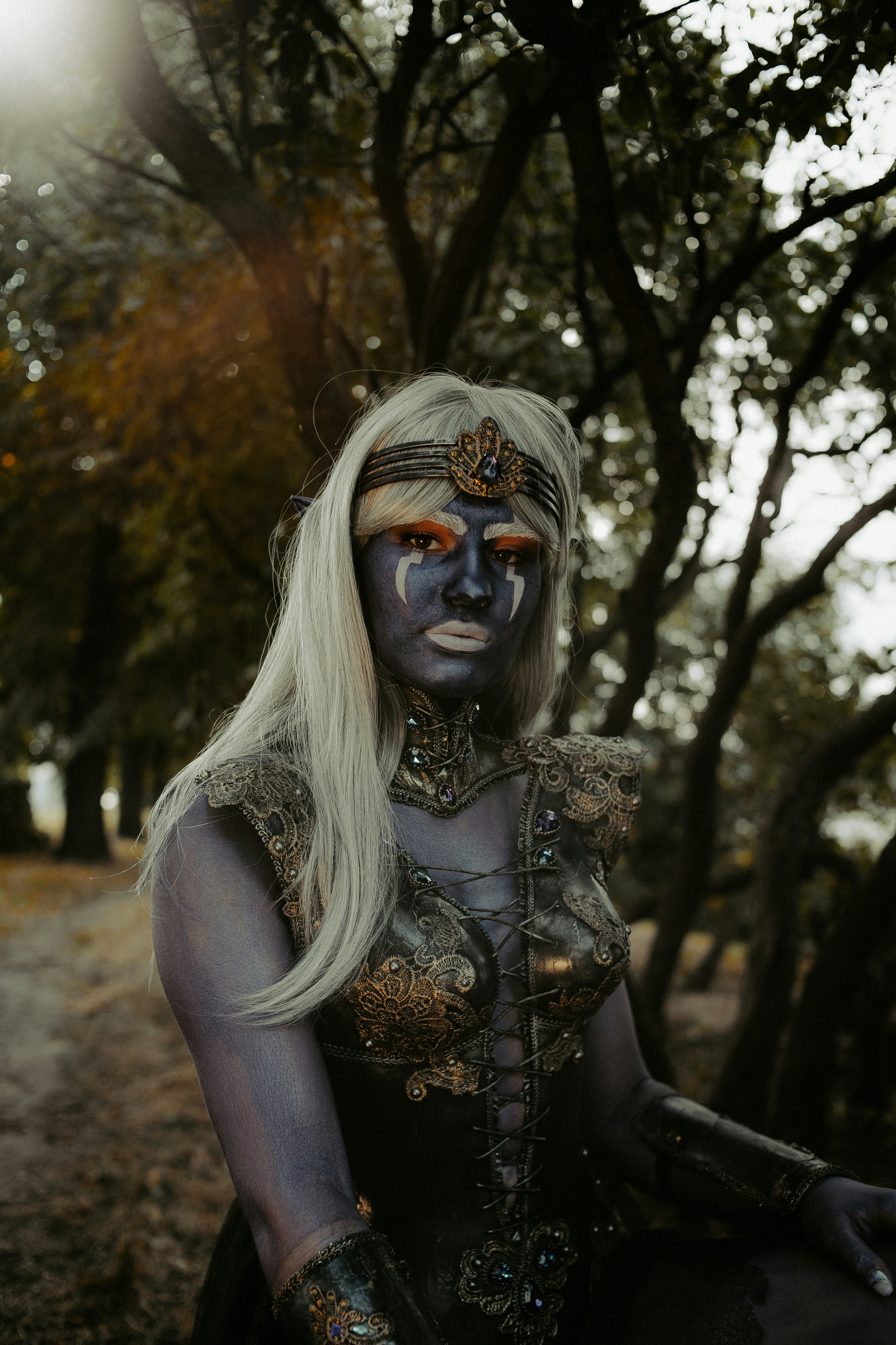 woman wearing yellow long-sleeved dress under white clouds and blue sky during daytime