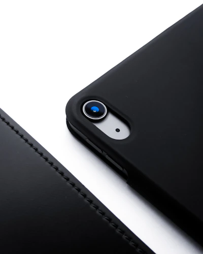 Close-up of a premium iPhone case showing its durable material and camera protection from the front angle.