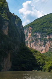 green and brown mountain under blue sky during daytime