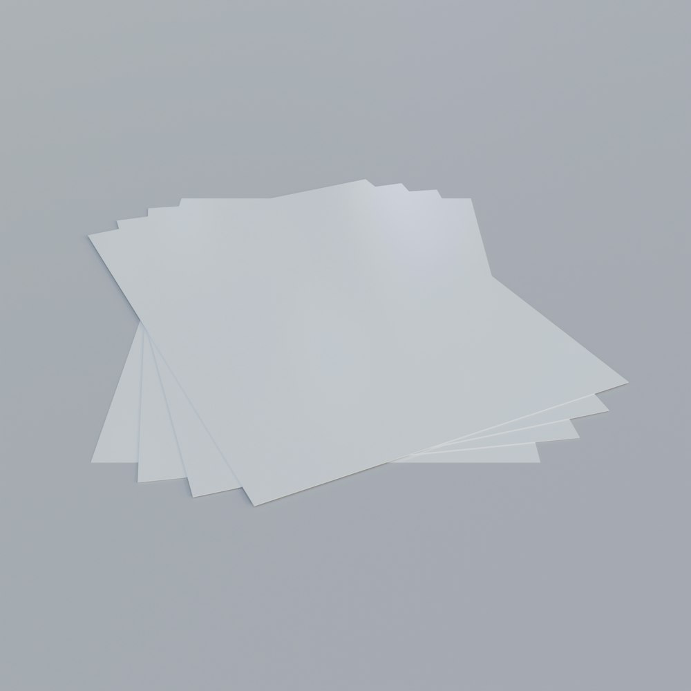 white printer paper on white surface