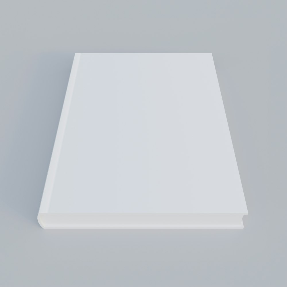 papier d’imprimante blanc sur surface blanche