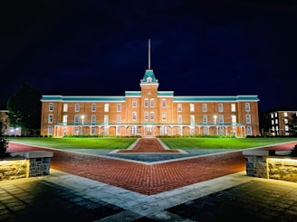 brown and white concrete building during nighttime