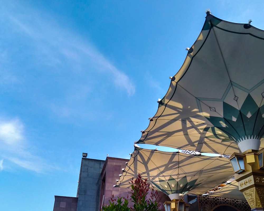 white and brown patio umbrella