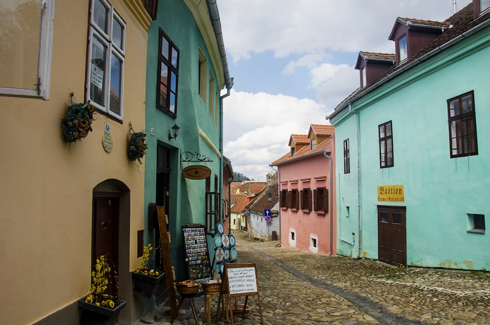 green and brown concrete houses during daytime