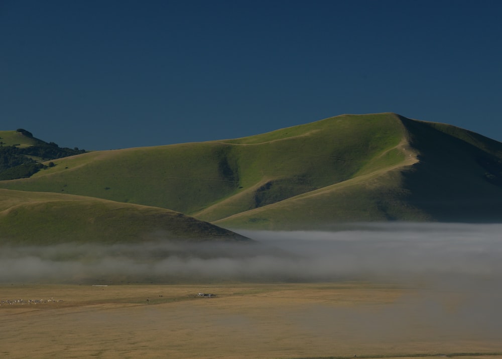 green mountain under blue sky during daytime