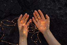 persons left hand with silver ring