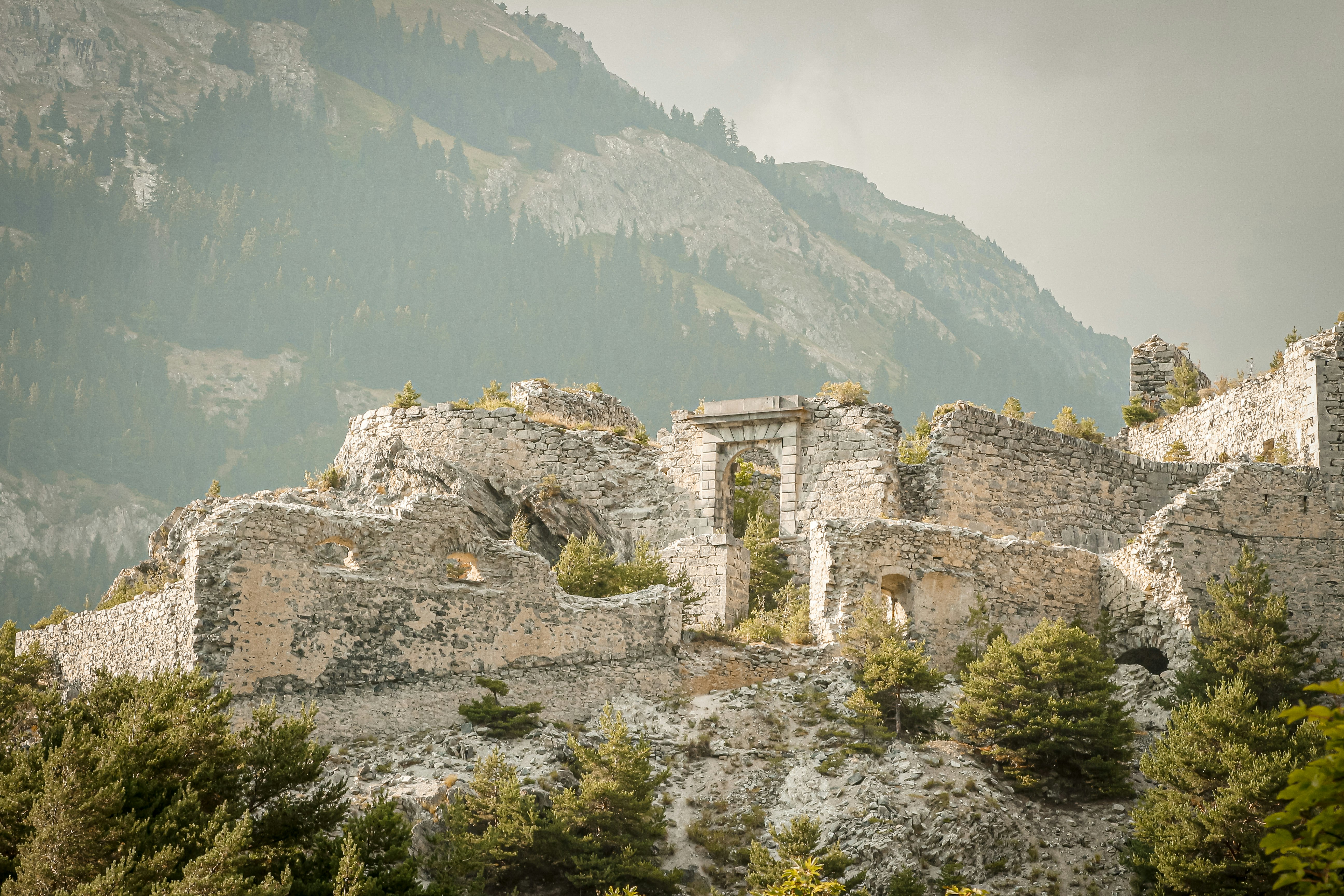 gray concrete building on top of mountain