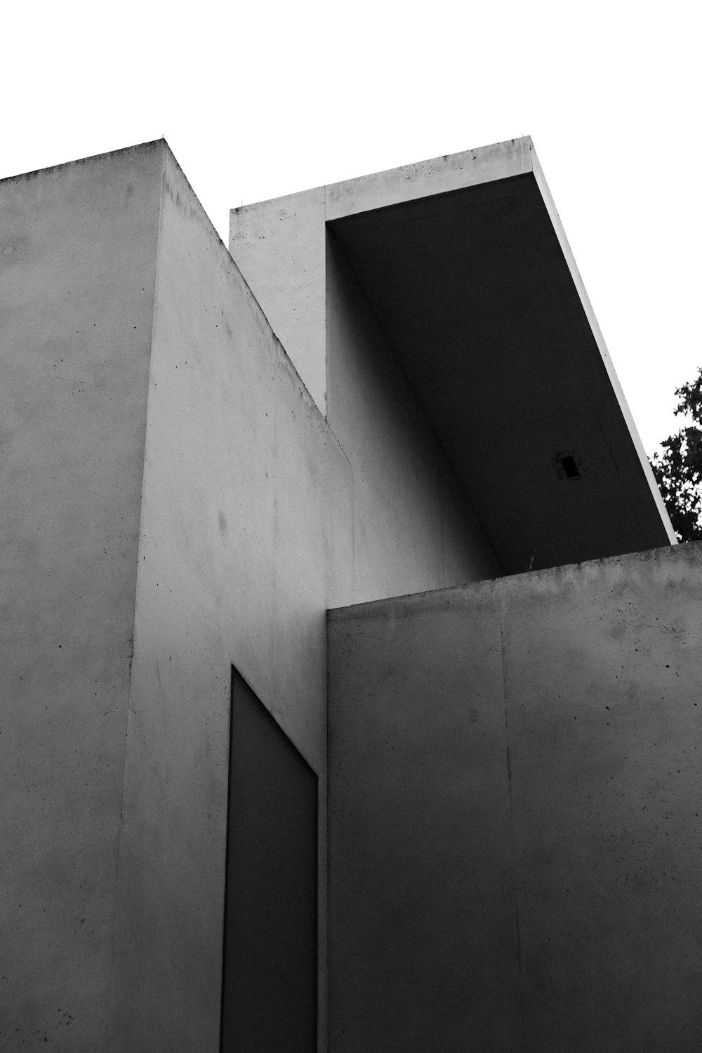 grayscale photo of concrete building