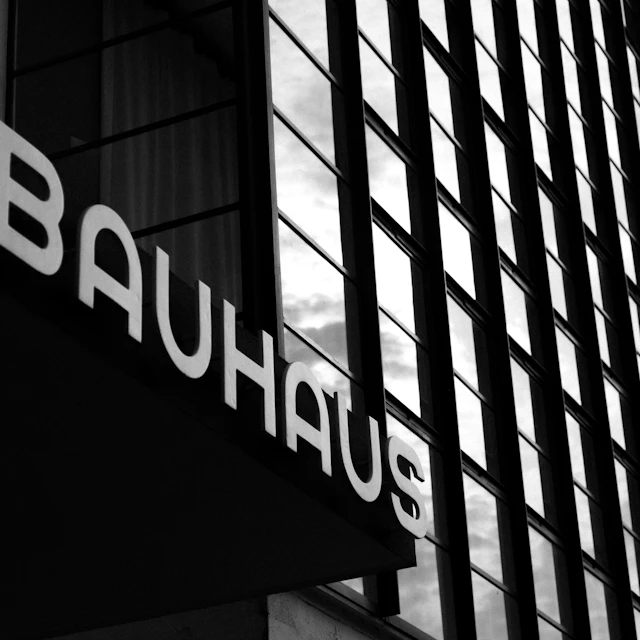 Black and white photo of a building with the Bauhaus lettering on its facade