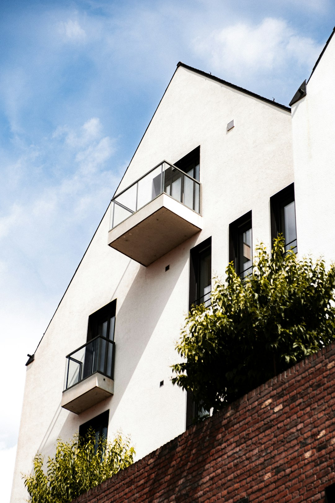 white and brown concrete building under blue sky during daytime