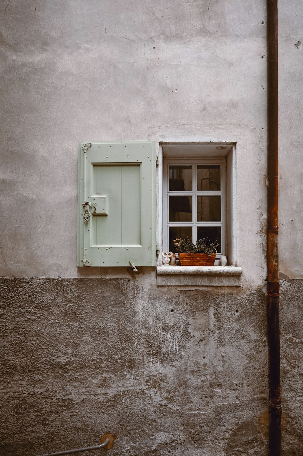 white wooden window with white wooden frame