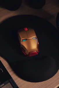 red and black cordless computer mouse