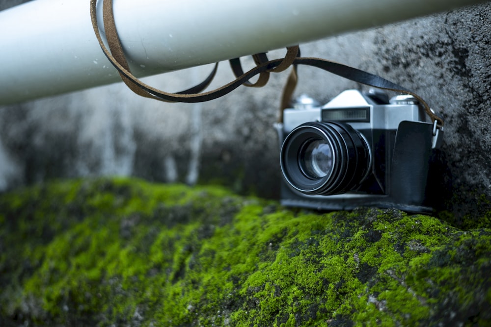 black camera on white pipe