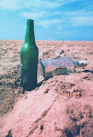 Scenic view of Ibiza beach with a jar of sand placed on the shore