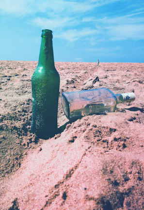 Scenic view of Ibiza beach with a jar of sand placed on the shore