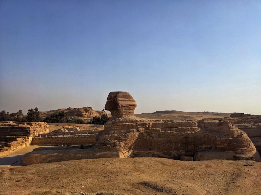 brown rock formation under blue sky during daytime