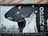 A black and white poster with bold lettering saying 'OPEN' on the right. The background includes abstract graphics with a large black shape and some pixelated areas. There are graffiti tags in white on the left side, and the text 'WE STAND WITH OUR COMMUNITY. 12PM-6PM MON-SAT' is visible in the bottom right corner.