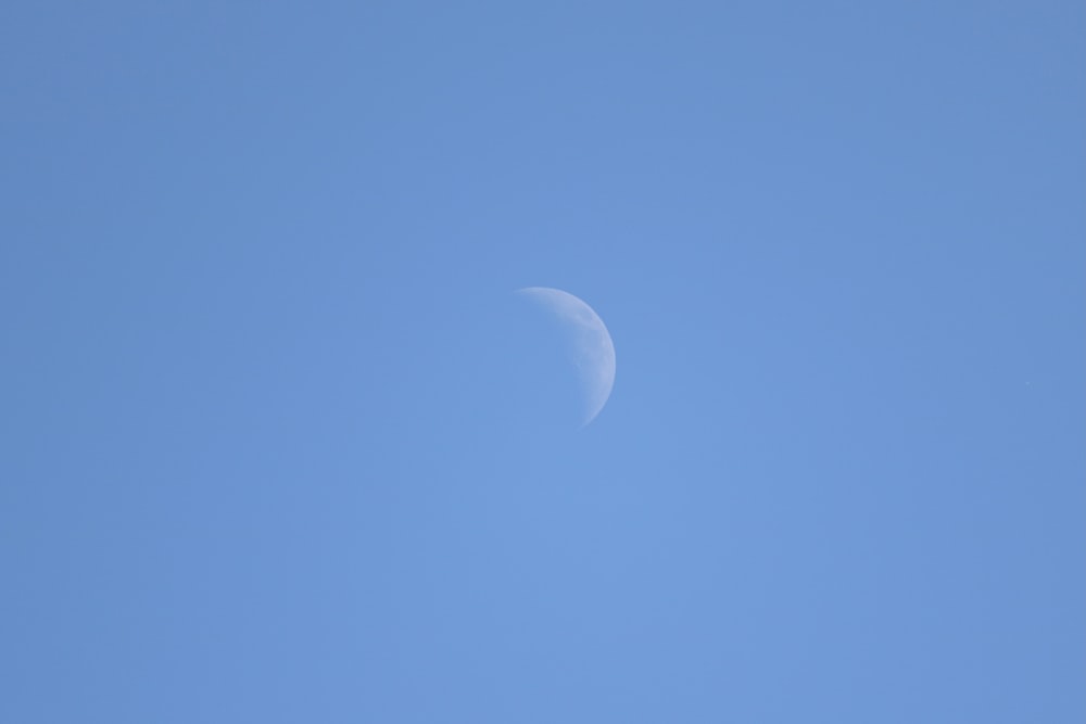 half moon in blue sky