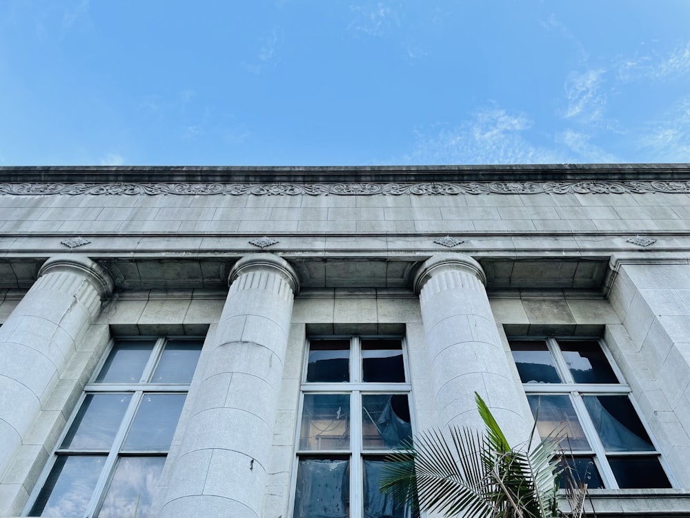 white concrete building under blue sky during daytime