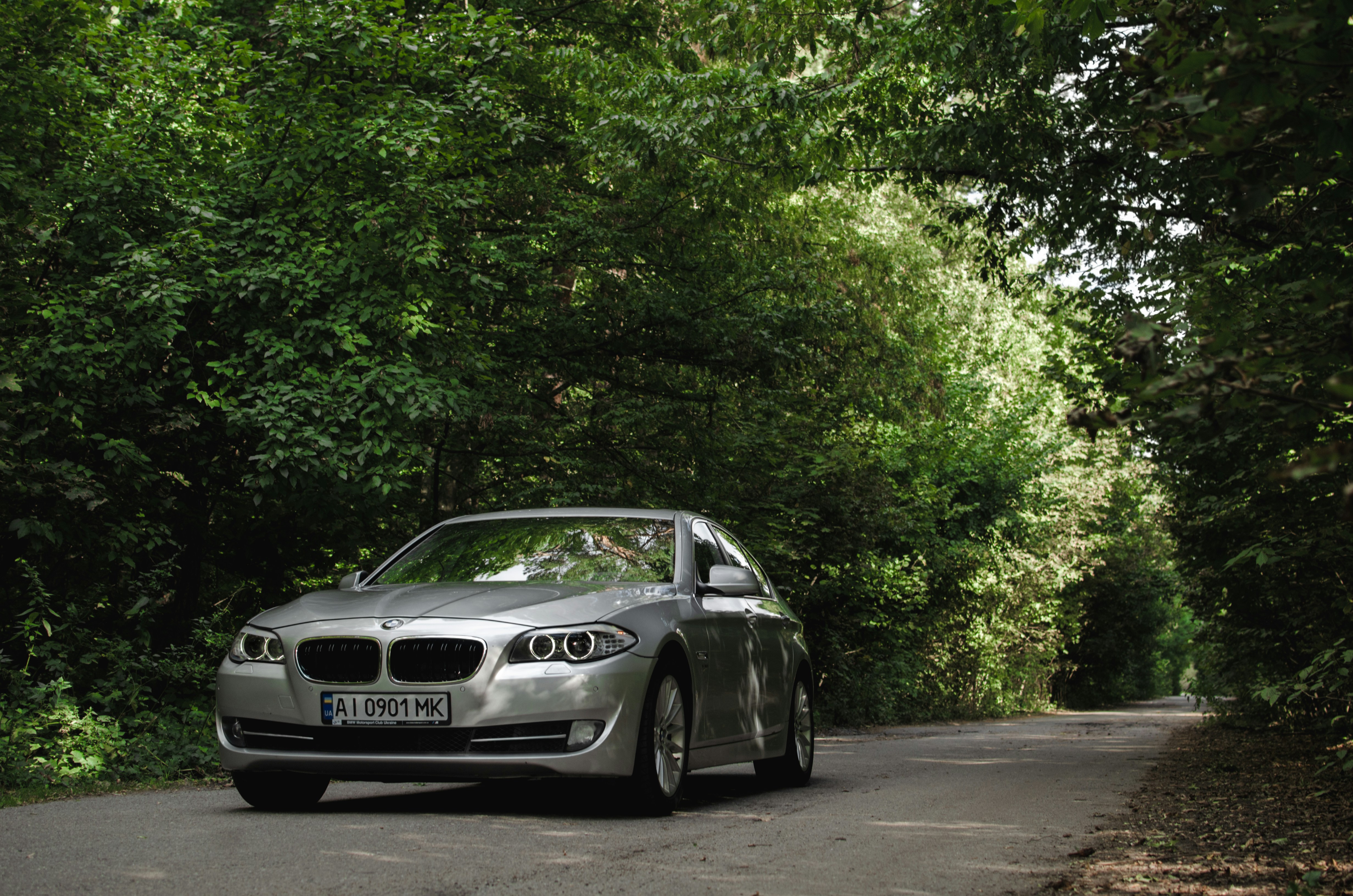 white bmw m 3 coupe parked on gray concrete road during daytime, 