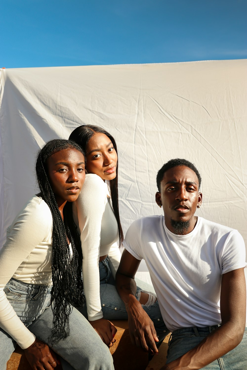 man in white crew neck t-shirt beside woman in white long sleeve shirt