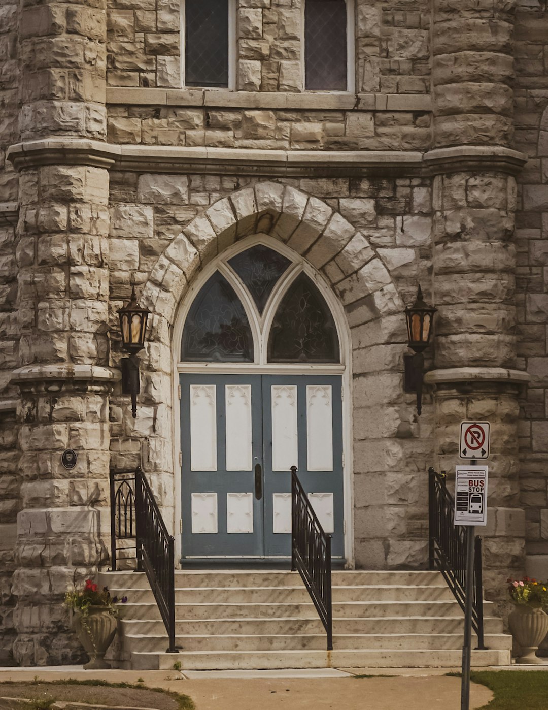 brown brick building with glass window