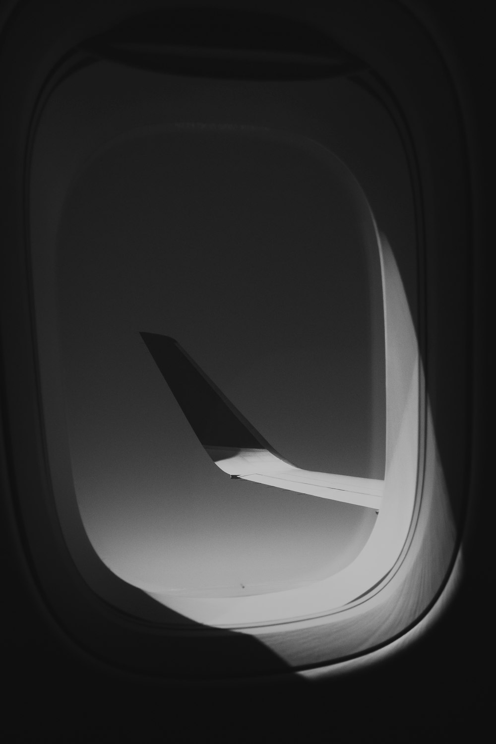 black and white airplane wing