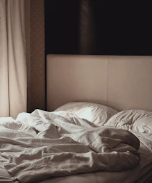 white and gray floral blanket