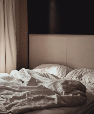 white and gray floral blanket