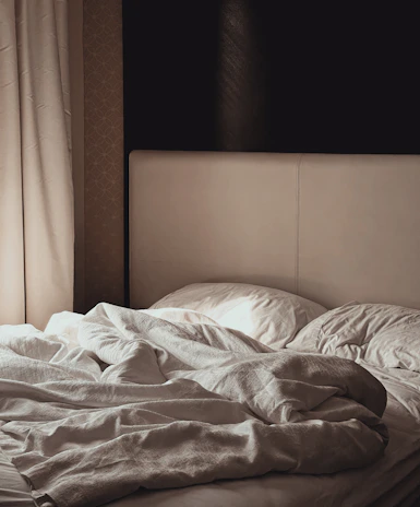 white and gray floral blanket