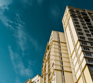 white concrete building under blue sky during daytime