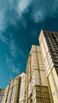 white concrete building under blue sky during daytime