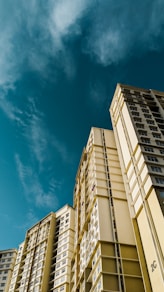 white concrete building under blue sky during daytime