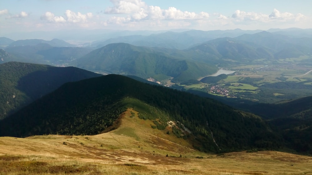 green mountains under white sky during daytime