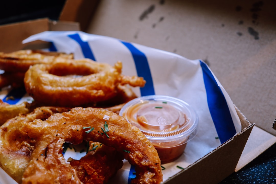 fried food on white and blue plastic container