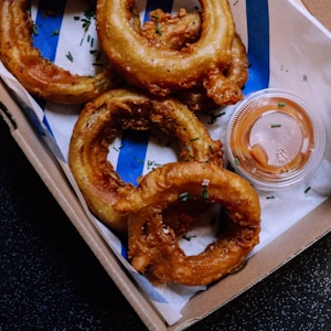 onion rings on white paper