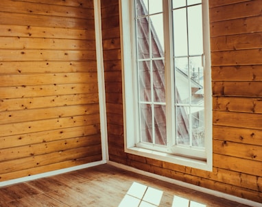 white wooden framed glass window