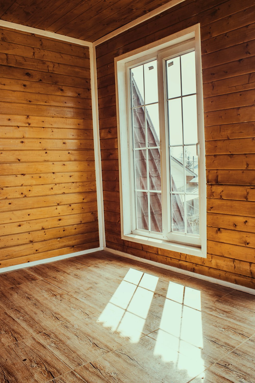 white wooden framed glass window