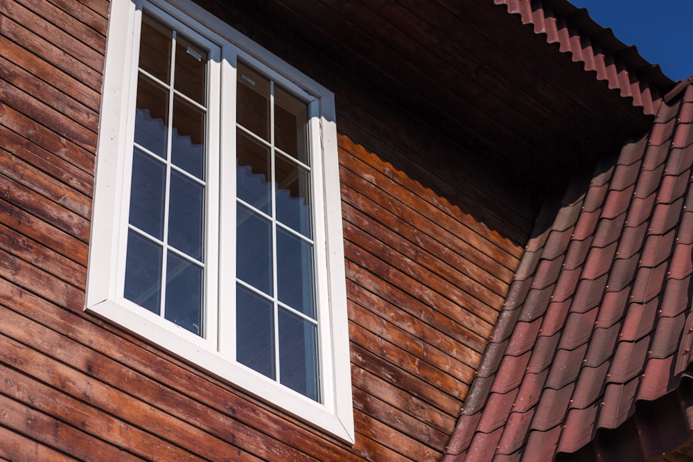 white wooden framed glass window