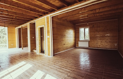 A framed room with clean, sturdy wooden beams ready for drywall.