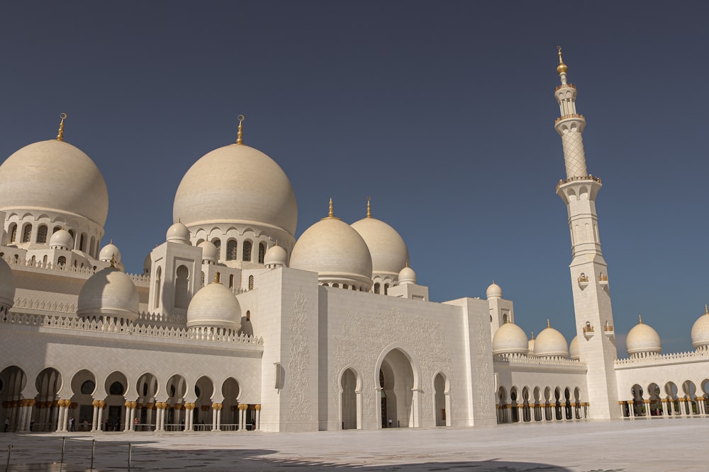 white concrete dome building under blue sky during daytime