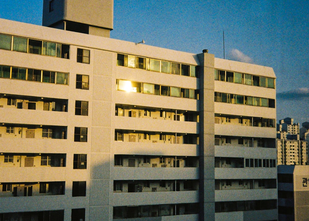 beige concrete building under blue sky during daytime